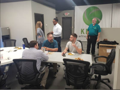 A few of our Charlotte team members enjoy chatting and a meal during one of our team appreciation events.